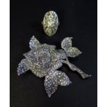 A Silver and Marcasite Rose Brooch ((63mm) and ring, 34g