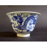 A 19th Century Chinese Blue and White Dragon Decorated Tea Bowl, four character mark to base.