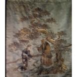 A 19th Century Chinese Gold Thread on Silk Embroidery decorated with two figures in a landscape,