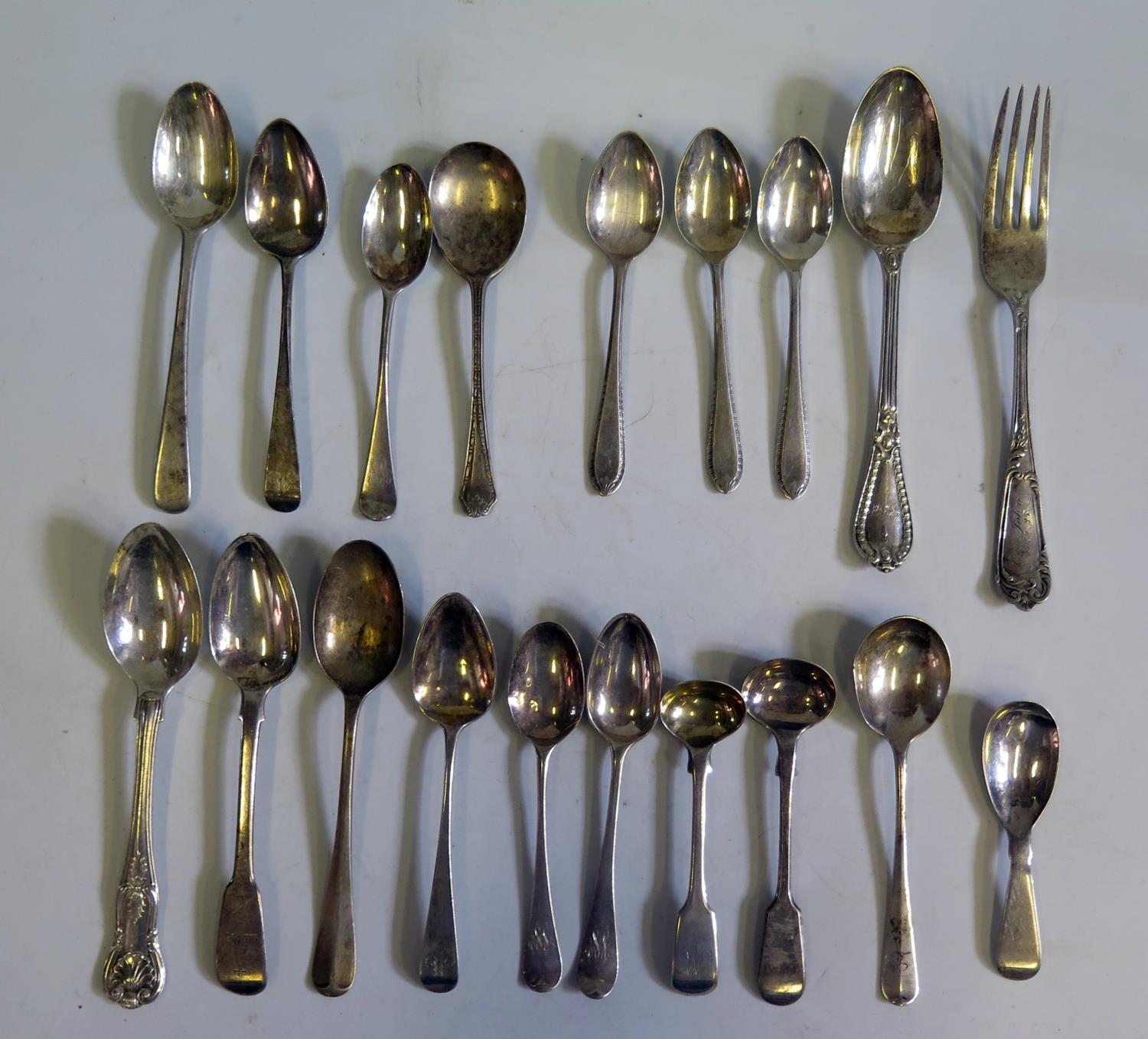 A Selection of Georgian and later Spoons and one fork, 297g hallmarked silver