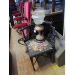 A Victorian Copper Oil Lamp and ebonised chair