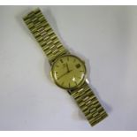 An Omega Gent's Wristwatch in a gold or gold plated case, boxed and with papers dated 1973, movement
