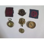 Two Middlesex Regimental Cap Badges, compasses etc.