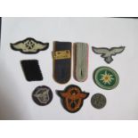 A Collection of German Military Cloth Badges including Edelweiss, Flying Technical Trade, paper