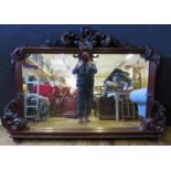 A Victorian Carved Mahogany Overmantle Mirror with foliate scroll decoration, 181(w)x127(h)cm