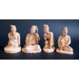 A 19th Century Set of Four Oriental Carved Ivory Figures, tallest 9.5cm. Some faults