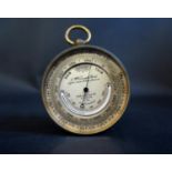 A Rare C.W. Dixey & Son Multi-function Pocket Barometer with compass to the back, remnants of