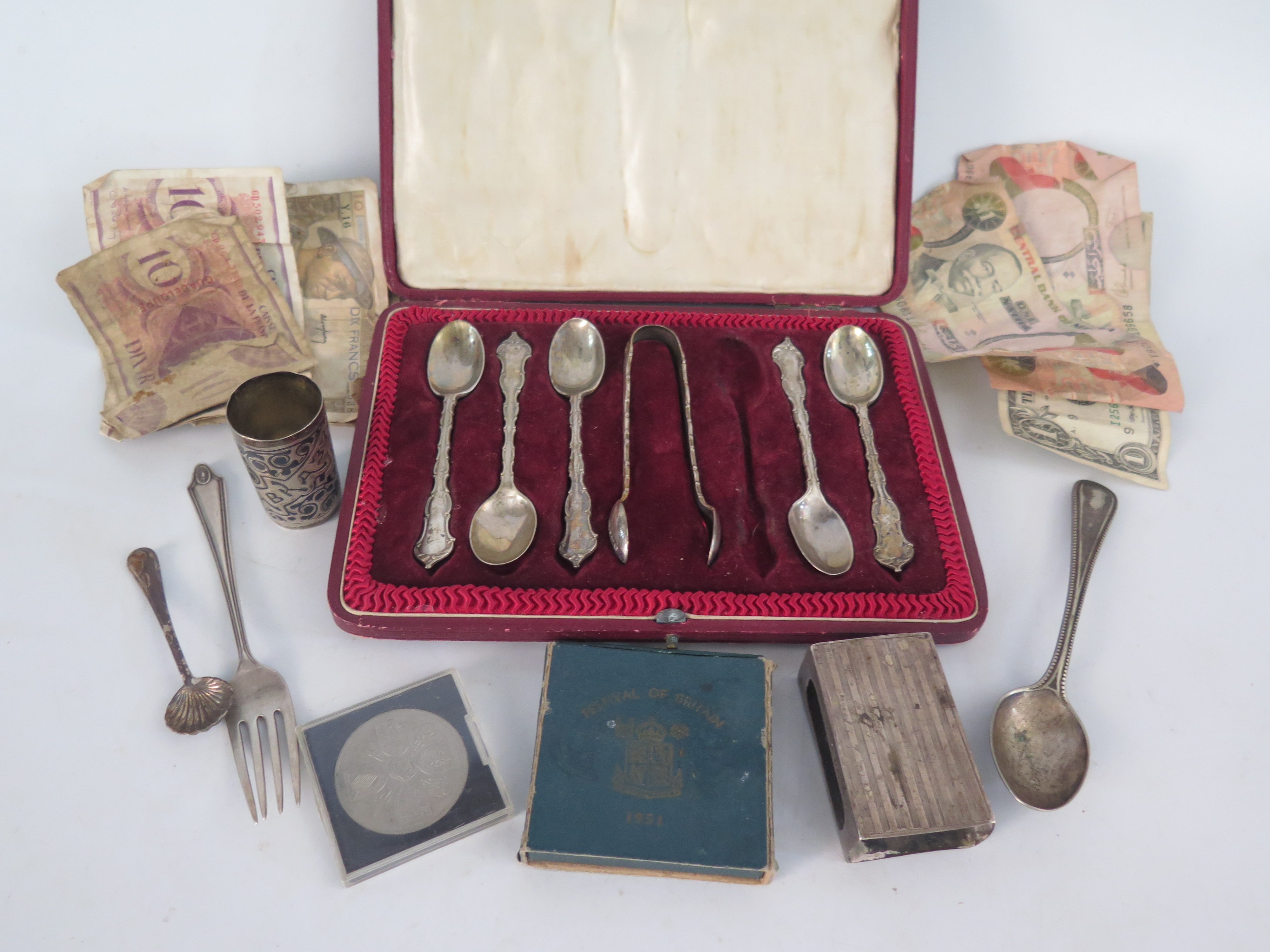 A Russian Silver and Niello Engraved Shot (28g), sterling silver teaspoons and tongs (140g), vest