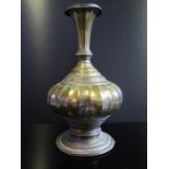 An Early Islamic Bronze Alloy Vase, 24cm high. Foot with split