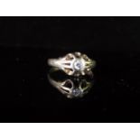 A Diamond Solitaire Ring in an unmarked gold setting, size O, 2.9g, .1ct DW