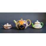 A Davenport Miniature Imari Palette Teapot (7cm high), Royal Crown Derby miniature teapot and one