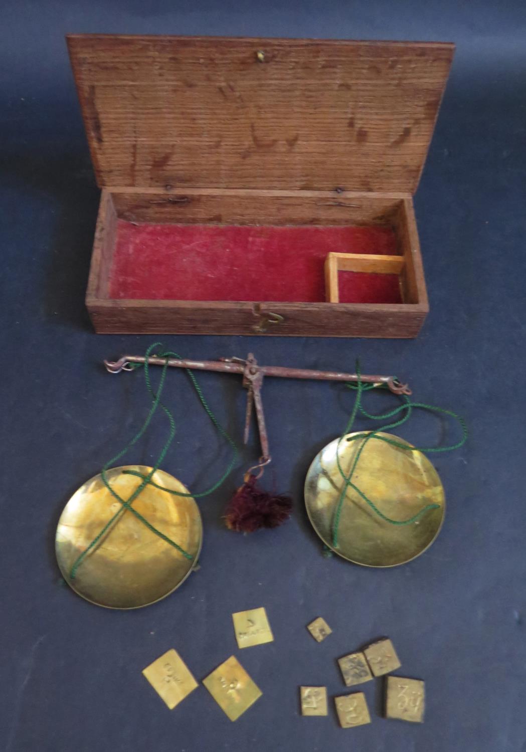 A 19th Century Oak Cased Set of Balance Scales with weights