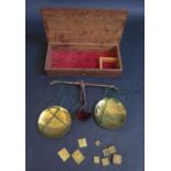 A 19th Century Oak Cased Set of Balance Scales with weights