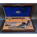 A Cased Bertonnet Revolver with gold inlay and carved grip made for the Argentinian market, top of