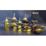 A Selection of Islamic Coffee Pots, measures, copper tea pot, brass lamp and Bideford pottery jug