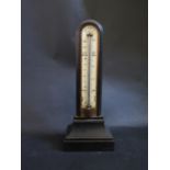 A Victorian Thermometer in an ebonised case by W. Dixey of 241 Oxford Street London, 32cm high