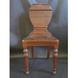 A Victorian Carved Oak Hall Chair