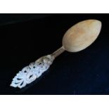 A Russian Carved and Pierced Treen Spoon, 21cm