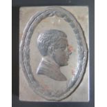 A Steel Book Plate bearing the bust of Edward VII? bordered by a wreath, 71x51mm