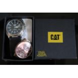 A CAT Wristwatch and Skagen