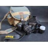 A Nikon D50 DSLR with Tamron Aspherical XR DiII 18-200 f. 1:3.5-6.3 in Town & Country bag and with