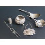 A Sterling Silver PORT Label and pepper, a Netherlands silver sugar sifting spoon and white metal,