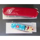 A Victorinox Classic Dream Big 2016 Ltd. Ed. (boxed) and Cigar 36 (red, boxed, 2.5703.E)