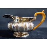 An Austro Hungarian Silver Cream Jug with ivory handle, c. 19cm lip to handle, dated 184?, 325g