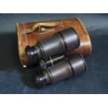 A Pair of HENRY LAURANCE Binoculars in leather case