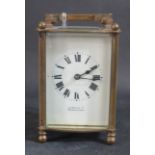 A French Brass Carriage Clock, Dial signed by J.E. Beale Ltd. of Bournemouth, height 15cm