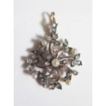 A Rose Cut Diamond and Pearl Flower Head Pendant, 29mm diam., 43mm drop, 7.8g,
