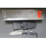 An Heckler & Koch Tanto Belt Knife with plastic sheath, boxed marked HK36XRP, 14100 (new old shop