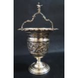 A Continental Silver Vessel with embossed scrolling acanthus leaf decoration and finial with