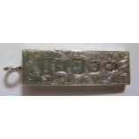 A Silver Jubilee Year Silver Ingot Pendant with chased scrolling decoration, 5.5cm, 30.9g