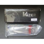 A Kizer Gun Metal Alloy Lock Knife with one hand openingKi3302B-C, boxed new old stock