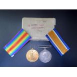 A Boxed WWI Medal Pair awarded to 150997 GNR. P. GREEN. R.A.