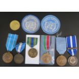 A Collection of U.N. Medals including In The Service of Peace awarded to 23301862 SGT. B.K.