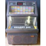 A NSM Galaxy 200 Jukebox, working order, one record sticking. Sold with approx. 400 singles