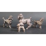 A Small Hallmarked Cast Sterling Silver Poodle, (2.4cm high) and one larger hallmarked cast silver