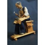 An Hand Driven Model of a Cobbler, signed E.A. Williamson 1980, c.29cm high