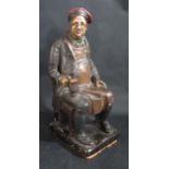 An Early Plaster Figure of a Seated of a Taverner with a Tankard, 39cm tall