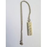 A Silver Jubilee Year Silver Ingot Pendant (5.5cm) on 56cm chain, 31.3g