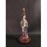 A Chinese Famille Vert Porcelain Female Figural Lamp holding a scroll, base of lamp with newspaper