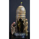 A Bergman Style Orientalist Cold Painted Bronze Figural Group depicting two men regarding a nude