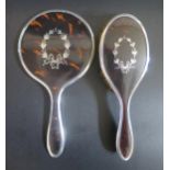 A George V Silver and Tortoiseshell Mounted Hand Mirror and Brush with harebell and ribbon inlay,