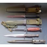 A Fairbairn Sykes Commando Knife, bayonet and two sheath knives