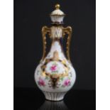 A Wedgwood Miniature Floral Decorated Vase with cover, 14cm
