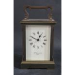 A Brass Carriage Clock retailed by Brufords of Exeter, 15cm, needs attention