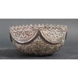 An Asian Unmarked Silver Plated Bowl with embossed wild animals and palm trees decoration, 11cm