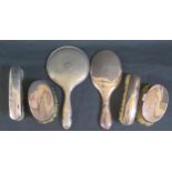 An Edward VII Silver Backed Hand Mirror (Chester 1907), one other silver backed hand mirror and four